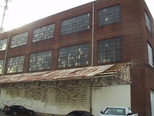 Pre-construction photos showing neglect of the building